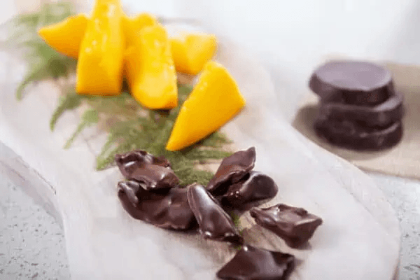 Green Sun Organic Vegan Dark Chocolate Covered Mango Food Items at Village Vitamin Store
